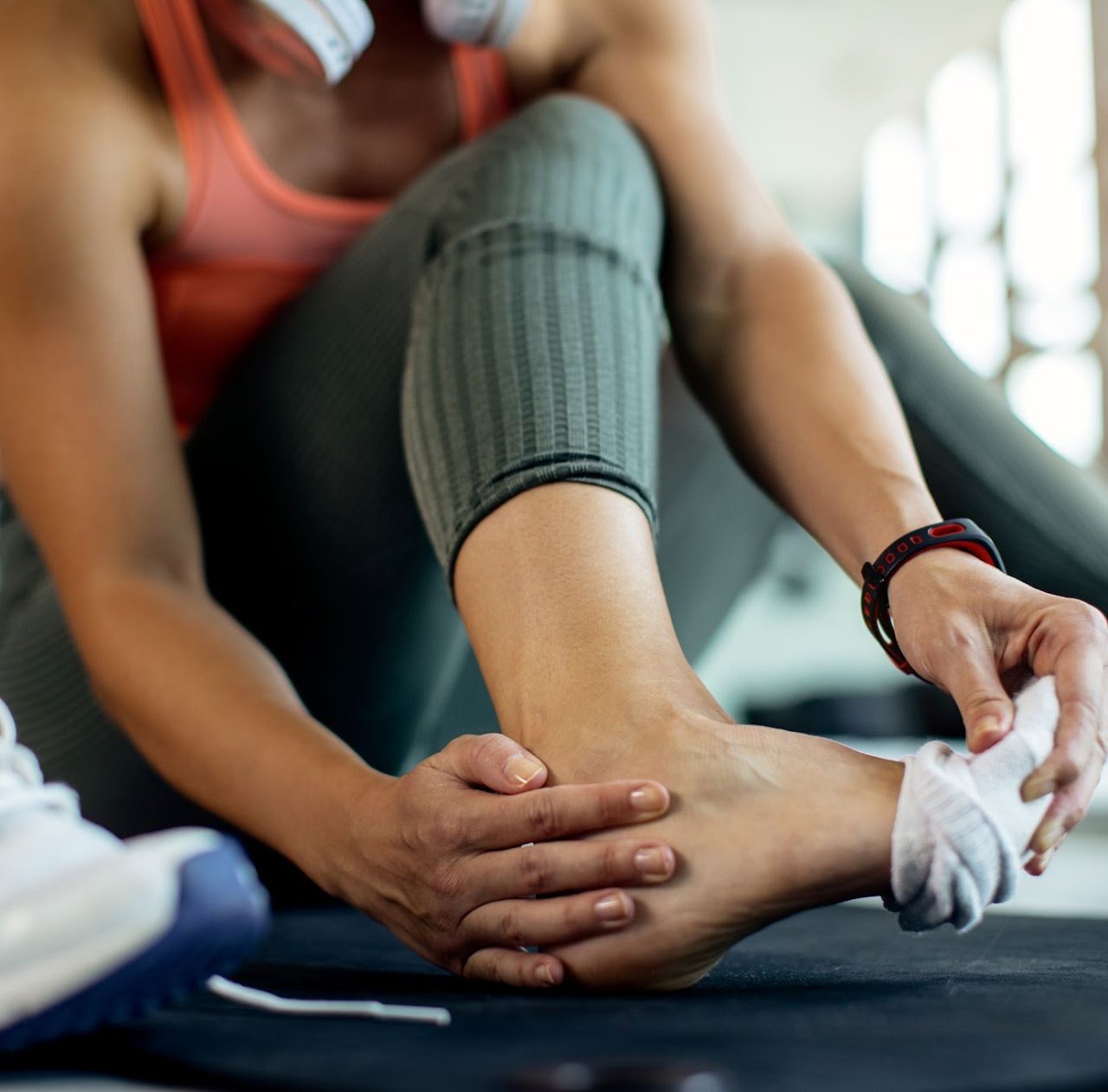Closeup Athletic Woman Injured Her Foot During Workout Gym