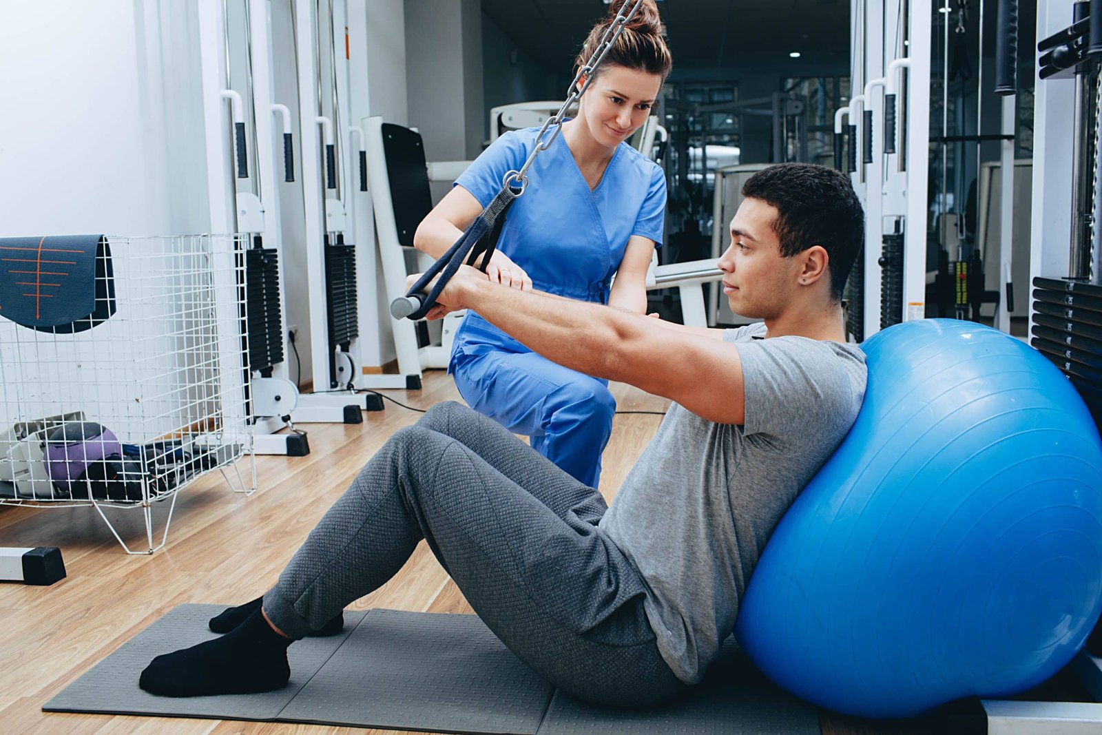 Objective Exercise Programming Young Man Doing Rehabilitation Exercise To Strengthen His Back Muscles Scaled 1